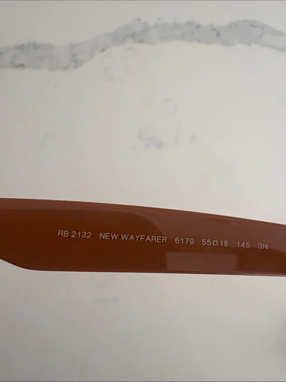 Men’s Ray Ban New Wayfarer sunglasses.